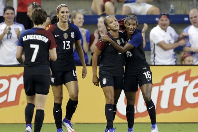 United States forward Mallory Pugh (2) is congratulated by Crystal Dunn (16) after scoring against Costa Rica in the first half of a women's international friendly soccer match, Friday, July. 22, 2016, in Kansas City, Kan. Looking on is defender Meghan Klingenberg (7) and forward Alex Morgan (13). (AP Photo/Colin E. Braley)