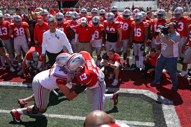 Apr 16, 2016; Columbus, OH, USA; Ohio State head coach Urban Meyer watches as the Scarlet and Gray teams runs tackle drills prior to the game at Ohio Stadium. Mandatory Credit: Aaron Doster-USA TODAY Sports