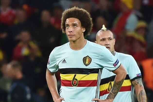 Belgium's midfielder Axel Witsel reacts after Wales' second goal during the Euro 2016 quarter-final football match between Wales and Belgium at the Pierre-Mauroy stadium in Villeneuve-d'Ascq near Lille, on July 1, 2016. / AFP / PHILIPPE HUGUEN        (Photo credit should read PHILIPPE HUGUEN/AFP/Getty Images)