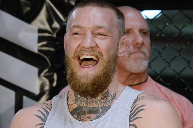 TORRENCE, CA - FEBRUARY 24:  UFC featherweight champion Conor McGregor laughs during a news conference with lightweight contender Nate Diaz at UFC Gym February 24, 2016, in Torrance, California. (Photo by Kevork Djansezian/Getty Images)
