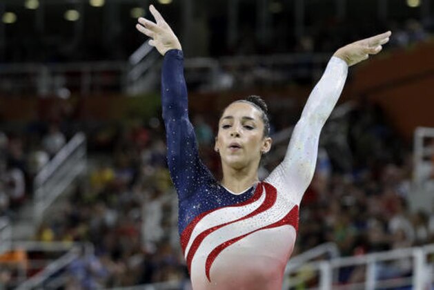United States' Aly Raisman performs on the balance beam during the artistic gymnastics women's team final at the 2016 Summer Olympics in Rio de Janeiro, Brazil, Tuesday, Aug. 9, 2016. (AP Photo/Rebecca Blackwell) United States' Aly Raisman performs on the balance beam during the artistic gymnastics women's team final at the 2016 Summer Olympics in Rio de Janeiro, Brazil, Tuesday, Aug. 9, 2016. (AP Photo/Rebecca Blackwell)