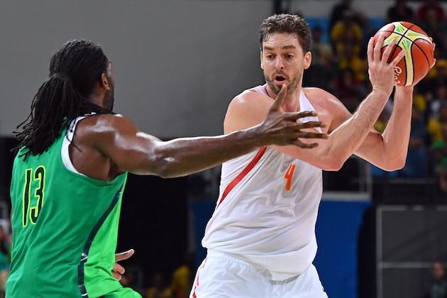 Brazil's centre Nene Hilario (L) defends against Spain's centre Pau Gasol during a Men's round Group B basketball match between Spain and Brazil at the Carioca Arena 1 in Rio de Janeiro on August 9, 2016 during the Rio 2016 Olympic Games. / AFP / Andrej ISAKOVIC        (Photo credit should read ANDREJ ISAKOVIC/AFP/Getty Images)