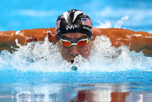 Aug 8, 2016; Rio de Janeiro, Brazil; Michael Phelps (USA) in the men's 200m butterfly semifinals during the Rio 2016 Summer Olympic Games at Olympic Aquatics Stadium. Mandatory Credit: Rob Schumacher-USA TODAY Sports