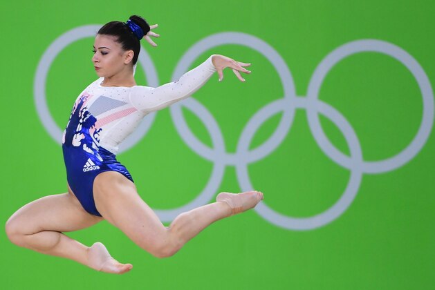 Britain's Claudia Fragapane competes in the Floor event during the women's team final Artistic Gymnastics at the Olympic Arena during the Rio 2016 Olympic Games in Rio de Janeiro on August 9, 2016. / AFP / Emmanuel DUNAND        (Photo credit should read EMMANUEL DUNAND/AFP/Getty Images)