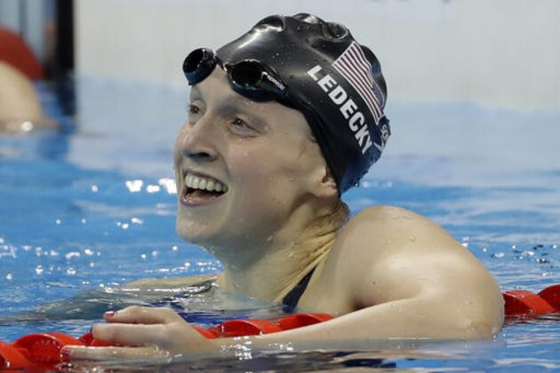 United States' Katie Ledecky celebrates winning the gold medal in the women's 200-meter freestyle during the swimming competitions at the 2016 Summer Olympics, Tuesday, Aug. 9, 2016, in Rio de Janeiro, Brazil. (AP Photo/Matt Slocum)