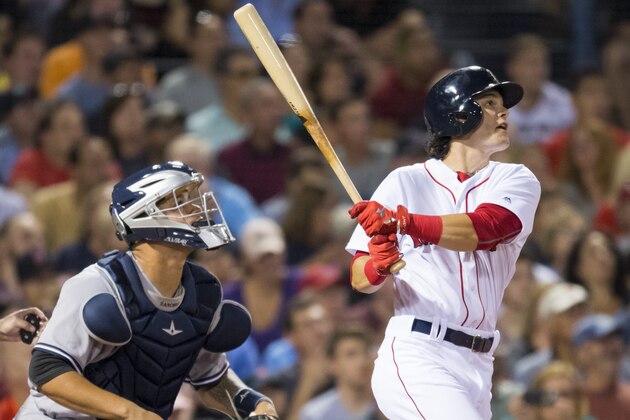 BOSTON, MA - AUGUST 9:   Andrew Benintendi #40 of the Boston Red Sox hits an RBI double against the New York Yankees in the fifth inning  on August 9, 2016  at Fenway Park in Boston, Massachusetts. (Photo by Michael Ivins/Boston Red Sox/Getty Images)
