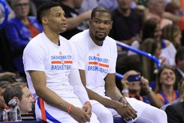 Oklahoma City Thunder guard Russell Westbrook, left, and Oklahoma City Thunder forward Kevin Durant, right, talk during a timeout during the second half of an NBA basketball game in Oklahoma City, Monday, April 11, 2016. Oklahoma City won 112-79. (AP Photo/Alonzo Adams) Oklahoma City Thunder guard Russell Westbrook, left, and Oklahoma City Thunder forward Kevin Durant, right, talk during a timeout during the second half of an NBA basketball game in Oklahoma City, Monday, April 11, 2016. Oklahoma City won 112-79. (AP Photo/Alonzo Adams)