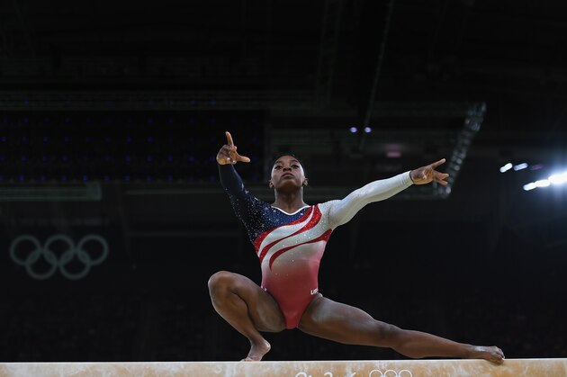 RIO DE JANEIRO, BRAZIL - AUGUST 09:  Simone Biles of the United States competes on the balance beam during the Artistic Gymnastics Women's Team Final  on Day 4 of the Rio 2016 Olympic Games at the Rio Olympic Arena on August 9, 2016 in Rio de Janeiro, Brazil.  (Photo by Laurence Griffiths/Getty Images)