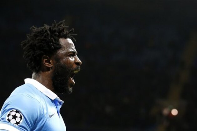 Manchester City's Wilfried Bony celebrates after scoring a goal during the Champions League Group D soccer match between Manchester City and Borussia Monchengladbach at the Etihad Stadium, Manchester, England, Tuesday, Dec. 8, 2015. (AP Photo/Jon Super)