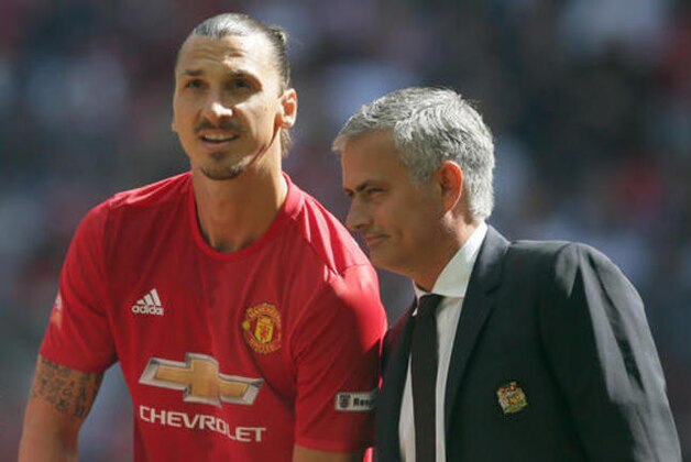 Manchester United manager Jose Mourinho, right, with Manchester United's Zlatan Ibrahimovic during the Community Shield soccer match between Leicester and Manchester United at Wembley stadium in London, Saturday April 9, 2016. (AP Photo/Tim Ireland)
