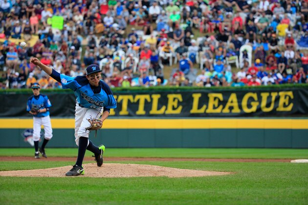 SOUTH WILLIAMSPORT, PA - AUGUST 23:  Starting pitcher Brennan Holligan #27 of of the West Team from Las Vegas, Nevada throws to a batter from the Great Lakes Team from Chicago, Illinois during the first inning of the United States Championship game of the Little League World Series at Lamade Stadium on August 23, 2014 in South Williamsport, Pennsylvania.  (Photo by Rob Carr/Getty Images)