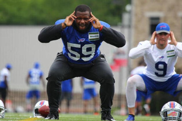 Buffalo Bills' Reggie Ragland (59) takes part in drills during NFL football training camp in Pittsford, N.Y., Saturday, July 30, 2016. (AP Photo/Jeffrey T. Barnes)