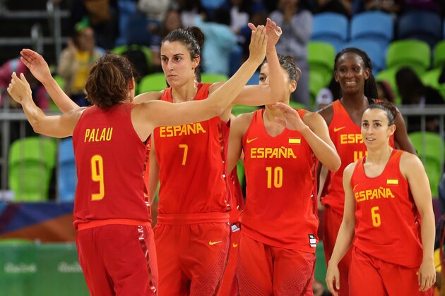 RIO DE JANEIRO, BRAZIL - AUGUST 10:  Alba Torrens #7 of Spain and Laia Palau #9 celebrate following their 89-68 win over China in the Women's Basketball Preliminary Round Group B match between China and Spain on Day 5 of the Rio 2016 Olympic Games at Youth Arena on August 10, 2016 in Rio de Janeiro, Brazil.  (Photo by Rob Carr/Getty Images)