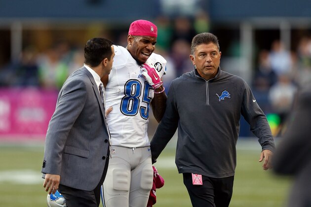 SEATTLE, WA - OCTOBER 05:  Eric Ebron #85 of the Detroit Lions reacts after suffering an apparent knee injury during the game against the Seattle Seahawks at CenturyLink Field on October 5, 2015 in Seattle, Washington.  (Photo by Stephen Brashear/Getty Images)