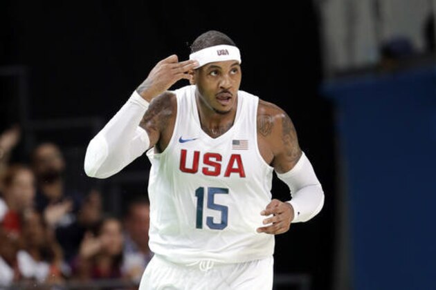 United States' Carmelo Anthony (15) signals ager make a score against Venezuela during a men's basketball game at the 2016 Summer Olympics in Rio de Janeiro, Brazil, Monday, Aug. 8, 2016. (AP Photo/Eric Gay)