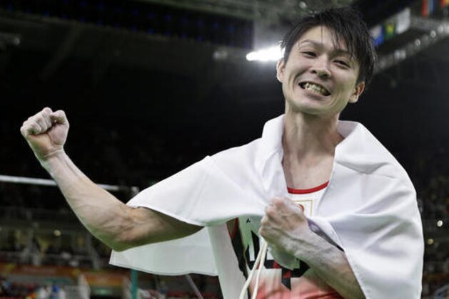 Japan's Kohei Uchimura celebrates his gold during the artistic gymnastics men's individual all-around final at the 2016 Summer Olympics in Rio de Janeiro, Brazil, Wednesday, Aug. 10, 2016. (AP Photo/Rebecca Blackwell)