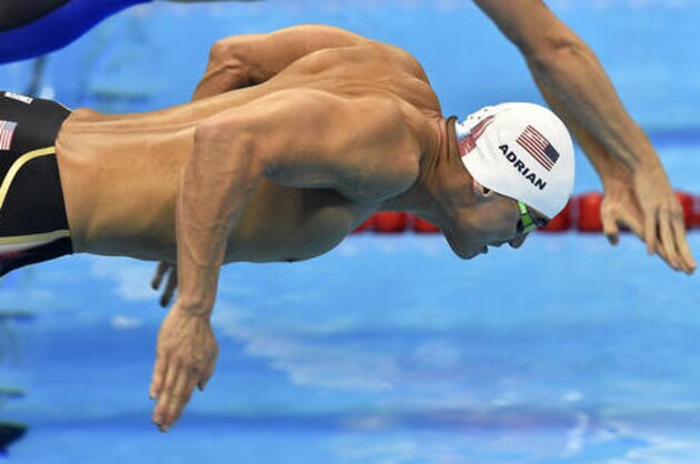 United States' Nathan Adrian starts a men's 100-meter freestyle heat during the swimming competitions at the 2016 Summer Olympics, Tuesday, Aug. 9, 2016, in Rio de Janeiro, Brazil. (AP Photo/Martin Meissner)
