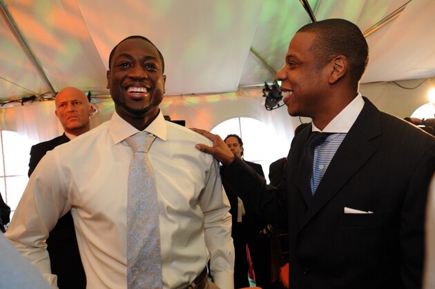 SECAUCUS, NJ - MAY 20:  Dwyane Wade (L) of the Miami Heat speaks to Jay-Z, Investor and Minority Owner of the New Jersey Nets prior to the 2008 NBA Draft Lottery at the NBATV Studios on May 20, 2008 in Secaucus, New Jersey.  NOTE TO USER: User expressly acknowledges and agrees that, by downloading and/or using this Photograph, user is consenting to the terms and conditions of the Getty Images License Agreement. Mandatory Copyright Notice: Copyright 2008 NBAE (Photo by Jennifer Pottheiser/NBAE via Getty Images)