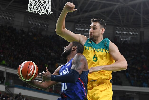 USA's guard Kyrie Irving (L) vies with Australia's centre Andrew Bogut during a Men's round Group A basketball match between Australia and USA at the Carioca Arena 1 in Rio de Janeiro on August 10, 2016 during the Rio 2016 Olympic Games. / AFP / Mark RALSTON        (Photo credit should read MARK RALSTON/AFP/Getty Images)