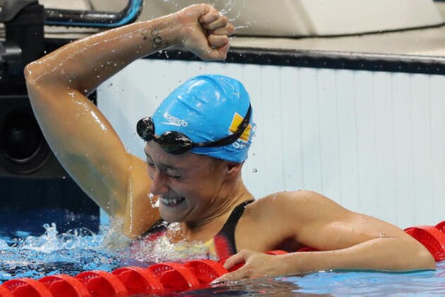 Spain's Mireia Belmonte Garcia celebrates winning the gold in the women's 200-meter butterfly during the swimming competitions at the 2016 Summer Olympics, Wednesday, Aug. 10, 2016, in Rio de Janeiro, Brazil. (AP Photo/Lee Jin-man)