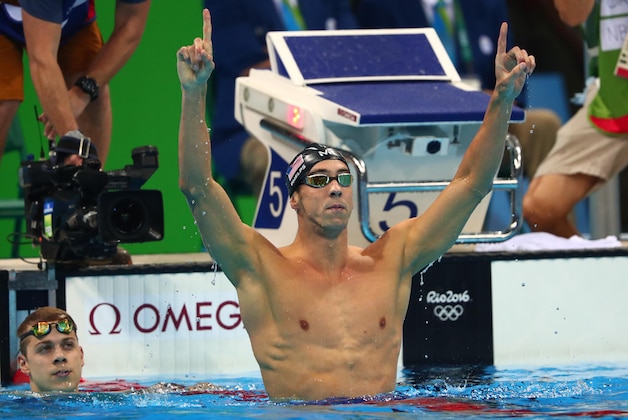 Aug 9, 2016; Rio de Janeiro, Brazil; Michael Phelps (USA) celebrates after winning the men's 200m butterfly final in the Rio 2016 Summer Olympic Games at Olympic Aquatics Stadium. Mandatory Credit: Rob Schumacher-USA TODAY Sports Aug 9, 2016; Rio de Janeiro, Brazil; Michael Phelps (USA) celebrates after winning the men's 200m butterfly final in the Rio 2016 Summer Olympic Games at Olympic Aquatics Stadium. Mandatory Credit: Rob Schumacher-USA TODAY Sports
