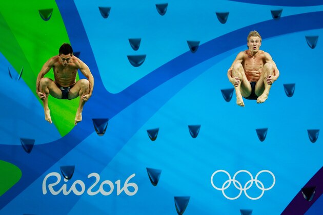 RIO DE JANEIRO, BRAZIL - AUGUST 10:  Jack Laugher and Chris Mears of Great Britain compete in the Men's Diving Synchronised 3m Springboard Final on Day 5 of the Rio 2016 Olympic Games at Maria Lenk Aquatics Centre on August 10, 2016 in Rio de Janeiro, Brazil.  (Photo by Adam Pretty/Getty Images)