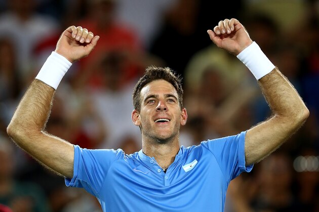 RIO DE JANEIRO, BRAZIL - AUGUST 07:  Juan Martin Del Potro of Argentina celebrates after victory  against Novak Djokovic of Serbia in their singles match on Day 2 of the Rio 2016 Olympic Games at the Olympic Tennis Centre on August 7, 2016 in Rio de Janeiro, Brazil.  (Photo by Clive Brunskill/Getty Images)