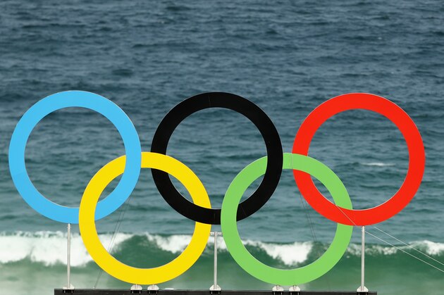 RIO DE JANEIRO, BRAZIL - AUGUST 08: The Olympic rings are seen during the Men's Beach Volleyball preliminary round Pool F match between Qatar and Spain on Day 3 of the Rio 2016 Olympic Games at the Beach Volleyball Arena on August 8, 2016 in Rio de Janeiro, Brazil.  (Photo by Ezra Shaw/Getty Images)