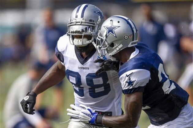 Dallas Cowboys wide receiver Dez Bryant (88) attempts to get around cornerback Morris Claiborne (24)  Dallas Cowboys' NFL football training camp, Monday, Aug. 1, 2016, in Oxnard, Calif. (AP Photo/Gus Ruelas)