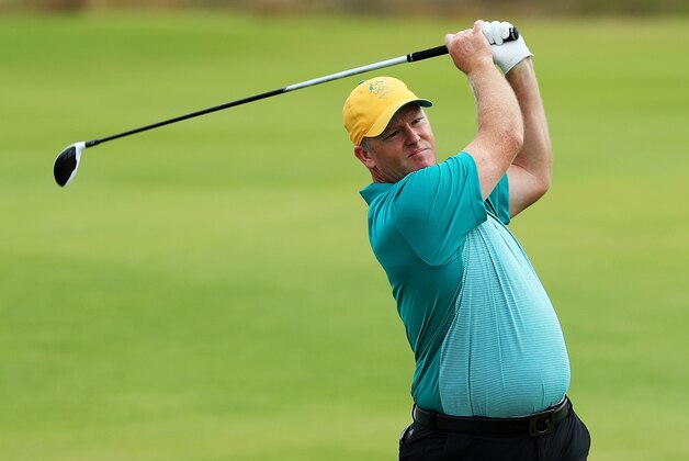 RIO DE JANEIRO, BRAZIL - AUGUST 11:  Marcus Fraser of Australia plays a shot on the 18th hole during the first round of men's golf on Day 6 of the Rio 2016 Olympics at the Olympic Golf Course on August 12, 2016 in Rio de Janeiro, Brazil.  (Photo by Scott Halleran/Getty Images)
