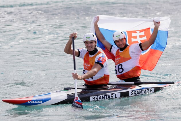 RIO DE JANEIRO, BRAZIL - AUGUST 11:  Ladislav Skantar and Peter Skantar of Slovakia celebrate winning gold medal after the Men's Canoe Double (C2) Final on Day 6 of the Rio 2016 Olympics at Whitewater Stadium on August 11, 2016 in Rio de Janeiro, Brazil.  (Photo by Jamie Squire/Getty Images)