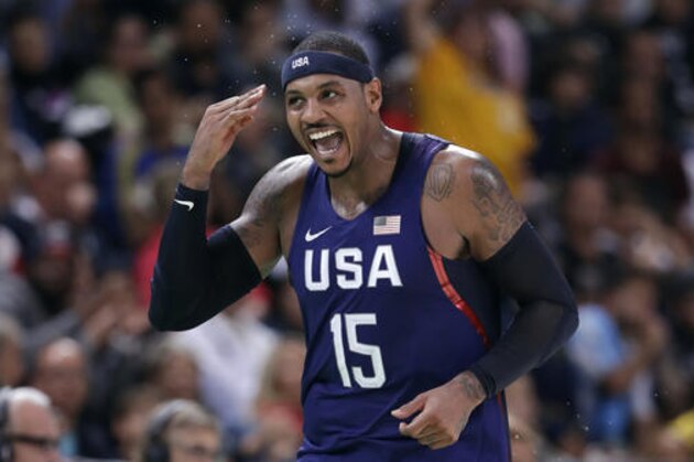 United States' Carmelo Anthony (15) celebrates after making a three-point basket during a basketball game against Australia at the 2016 Summer Olympics in Rio de Janeiro, Brazil, Wednesday, Aug. 10, 2016. (AP Photo/Charlie Neibergall)