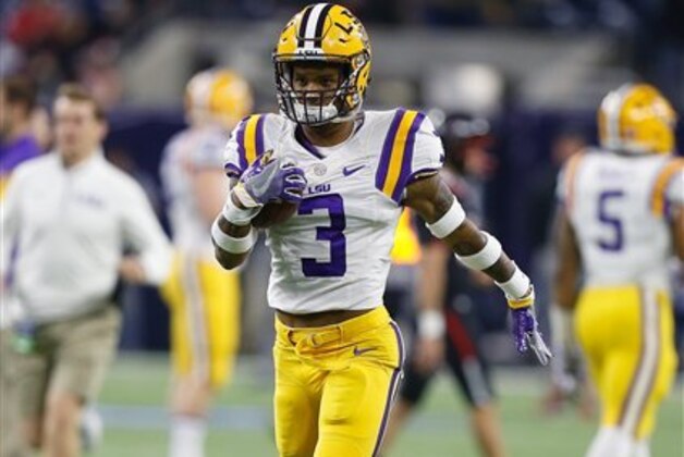 LSU wide receiver Tyron Johnson (3) receives a pass during warm-ups before playing Texas Tech  in the Texas Bowl NCAA football game Tuesday, Dec. 29, 2015, in Houston. LSU won 56-27. (AP Photo/Bob Levey)
