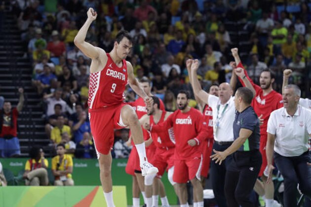 Croatia's Dario Saric (9) celebrates a score against Brazil during a men's basketball game at the 2016 Summer Olympics in Rio de Janeiro, Brazil, Thursday, Aug. 11, 2016. (AP Photo/Eric Gay)