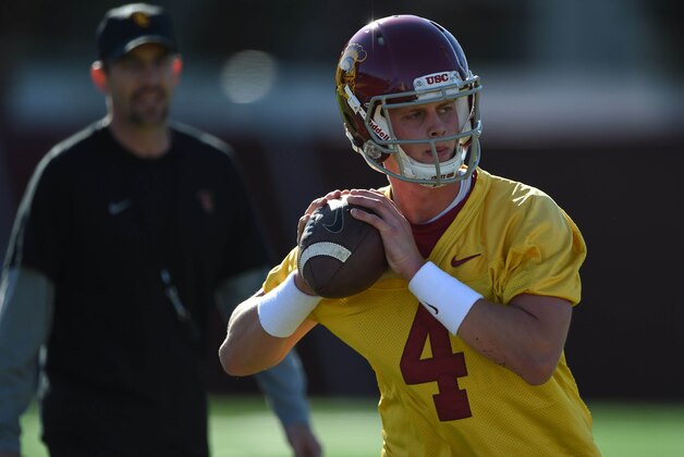 Mar 8, 2016; Los Angeles, CA, USA; Southern California Trojans quarterback Max Browne (4) throws a pass under the supervision of quarterbacks coach Tyson Helton during spring practice at Howard Jones Field. Mandatory Credit: Kirby Lee-USA TODAY Sports