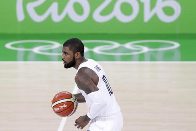 United States' Kyrie Irving (10) drives up court during a basketball game against Venezuela at the 2016 Summer Olympics in Rio de Janeiro, Brazil, Monday, Aug. 8, 2016. (AP Photo/Charlie Neibergall)