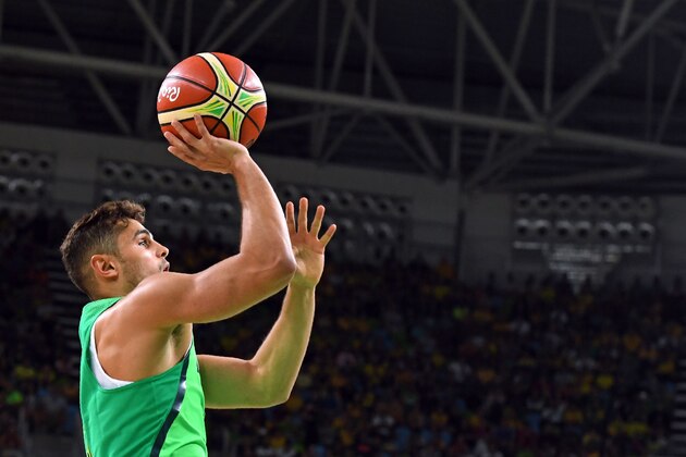 Brazil's point guard Raulzinho Neto takes a shot during a Men's round Group B basketball match between Spain and Brazil at the Carioca Arena 1 in Rio de Janeiro on August 9, 2016 during the Rio 2016 Olympic Games. / AFP / Mark RALSTON        (Photo credit should read MARK RALSTON/AFP/Getty Images)