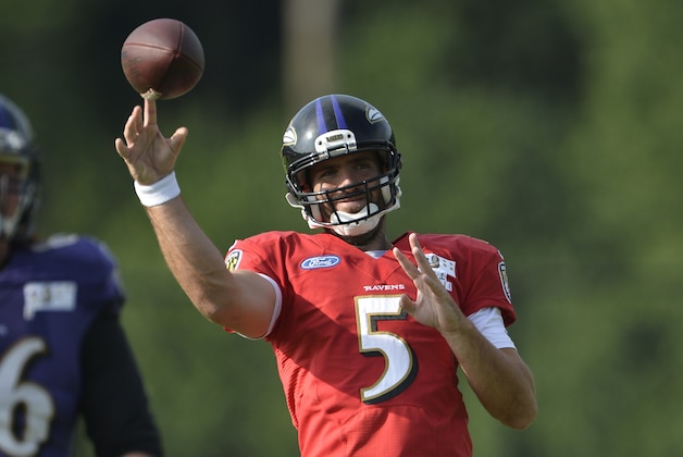 Jul 31, 2016; Owings Mills, MD, USA; Baltimore Ravens quarterback Joe Flacco (5) throws during the morning session of training camp at Under Armour Performance Center. Mandatory Credit: Tommy Gilligan-USA TODAY Sports