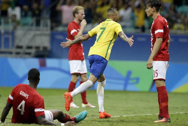 Brazil's Luan celebrates after scoring his team's third goal during a group A match of the men' s Olympic football tournament between Brazil and Denmark in Salvador, Brazil, Wednesday Aug. 10, 2016.(AP Photo/Leo Correa)