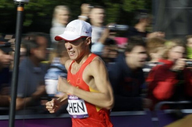 China'S Chen Ding competes in the men's 20-kilometer race walk at the 2012 Summer Olympics, in London, Saturday, Aug. 4, 2012. (AP Photo/Sergey Ponomarev)