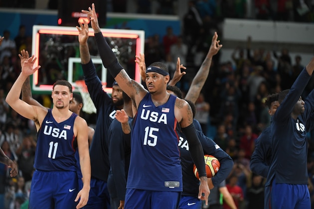RIO DE JANEIRO, BRAZIL - AUGUST 10:  Carmelo Anthony #15 of the USA Basketball Men's National Team celebrates with the team after the game against Australia on Day 5 of the Rio 2016 Olympic Games on August 10, 2016 at Barra Carioca Arena 1 in Rio de Janerio, Brazil. NOTE TO USER: User expressly acknowledges and agrees that, by downloading and or using this photograph, user is consenting to the terms and conditions of Getty Images License Agreement. Mandatory Copyright Notice: Copyright 2016 NBAE (Photo by Jesse D. Garrabrant/NBAE via Getty Images)