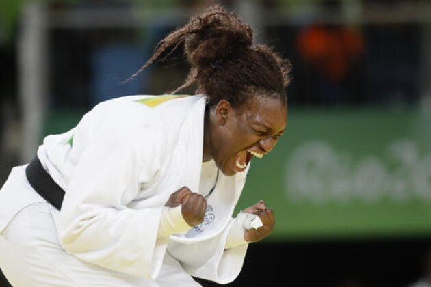 France's Emilie Andeol celebrates after winning the gold medal of the women's over 78-kg judo competition at the 2016 Summer Olympics in Rio de Janeiro, Brazil, Friday, Aug. 12, 2016. (AP Photo/Markus Schreiber)