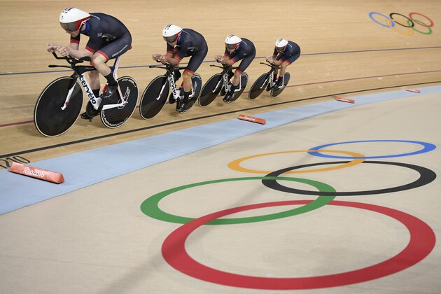 (From L) Britain's Edward Clancy, Britain's Steven Burke, Britain's Owain Doull and Britain's Bradley Wiggins compete in the men's Team Pursuit qualifying track cycling event at the Velodrome during the Rio 2016 Olympic Games in Rio de Janeiro on August 12, 2016. / AFP / Eric FEFERBERG        (Photo credit should read ERIC FEFERBERG/AFP/Getty Images)