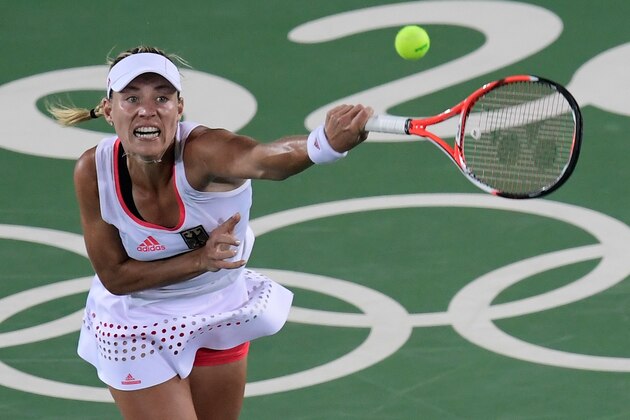 Germany's Angelique Kerber serves the ball to US player Madison Keys during their women's singles semi-finals tennis match at the Olympic Tennis Centre of the Rio 2016 Olympic Games in Rio de Janeiro on August 12, 2016. / AFP / JAVIER SORIANO        (Photo credit should read JAVIER SORIANO/AFP/Getty Images)