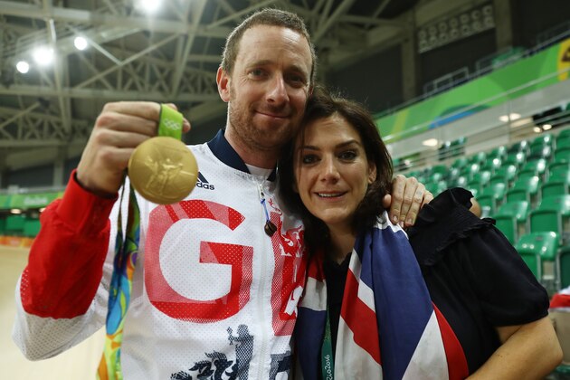 RIO DE JANEIRO, BRAZIL - AUGUST 12:  Gold medalist Bradley Wiggins of Team Great Britain and his wife Catherine pose for photographs after at the medal ceremony for the Men's Team Pursuit Final for Gold on Day 7 of the Rio 2016 Olympic Games at the Rio Olympic Velodrome on August 12, 2016 in Rio de Janeiro, Brazil.  (Photo by Bryn Lennon/Getty Images)