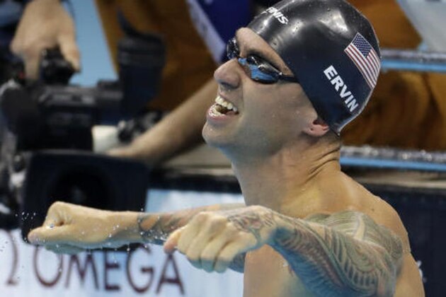 United States' Anthony Ervin celebrates after winning the men's 50-meter freestyle final during the swimming competitions at the 2016 Summer Olympics, Friday, Aug. 12, 2016, in Rio de Janeiro, Brazil. (AP Photo/Julio Cortez)