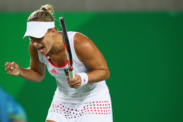 RIO DE JANEIRO, BRAZIL - AUGUST 12:  Angelique Kerber of Germany celebrates match point against Madison Keys of the United States during the women's singles semifinal match on Day 7 of the Rio 2016 Olympic Games at the Olympic Tennis Centre on August 12, 2016 in Rio de Janeiro, Brazil.  (Photo by Clive Brunskill/Getty Images)
