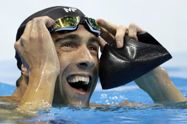 United States' Michael Phelps reacts after the men's 100-meter butterfly final during the swimming competitions at the 2016 Summer Olympics, Friday, Aug. 12, 2016, in Rio de Janeiro, Brazil. (AP Photo/Michael Sohn)