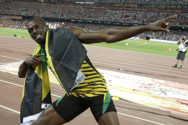 FILE - In this Aug. 23, 2015, file photo, Jamaica's Usain Bolt celebrates after winning the gold medal in the men's 100-meter ahead of United States' at the World Athletics Championships at the Bird's Nest stadium in Beijing. Even though David Rudisha, the 800-meter Olympic champion from Kenya, refers to Bolt as his brother from another mother, you really couldn’t get two more contrasting characters. (AP Photo/Lee Jin-man, File)