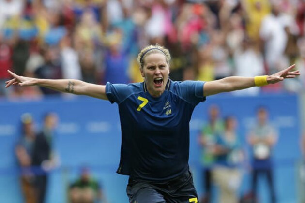 Sweden's Lisa Dahlkvist celebrates after scoring in the penalty kicks during a quarter-final match of the women's Olympic football tournament between the United States and Sweden in Brasilia Friday Aug. 12, 2016. Sweden beat the United Sates on penalty shootout.(AP Photo/Eraldo Peres)